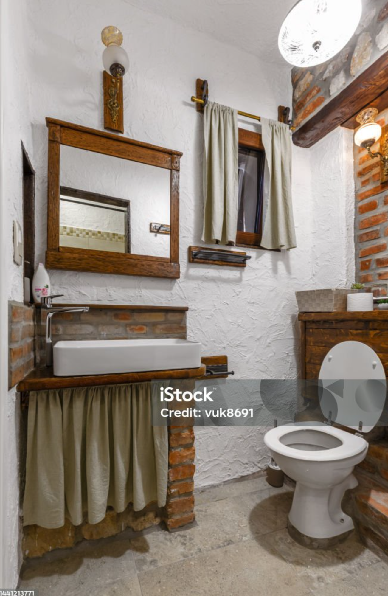 Rustic bathroom with stone and brick details